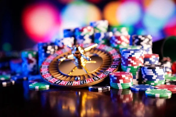 Live casino studio with professional croupier at blackjack table and multi-camera setup
